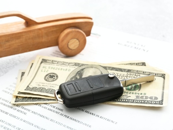 Rental Agreement with Car Key and Money