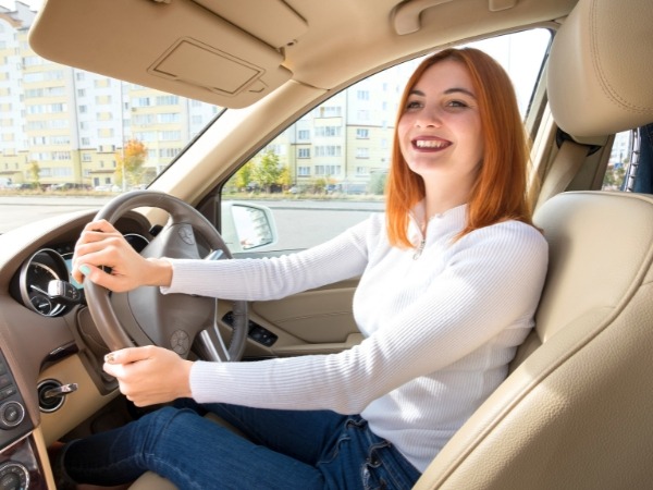 Woman Driving a Car