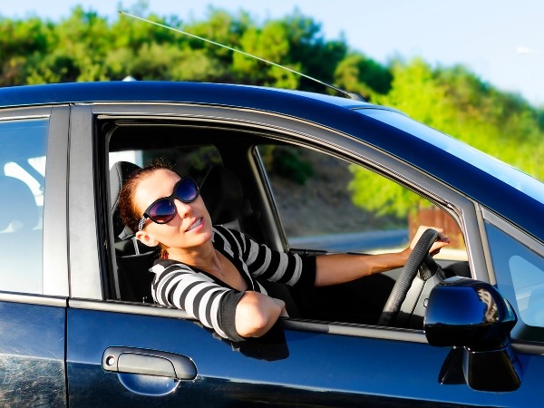 Woman Driving a Car